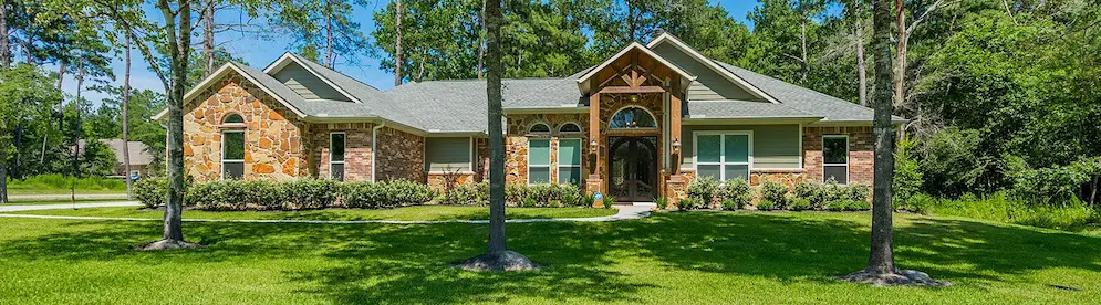 Charming home with a spacious lawn and mature trees