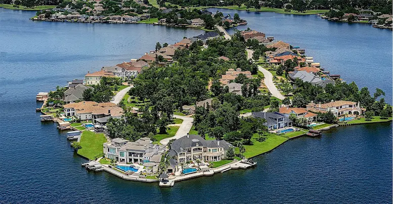 Aerial view of a large island featuring residential houses
