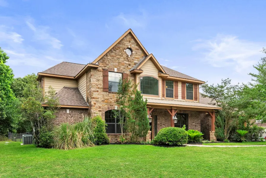 A large house surrounded by a generous yard