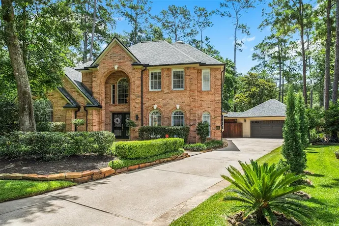 Single-family home, showcasing a welcoming exterior and well-maintained landscaping.